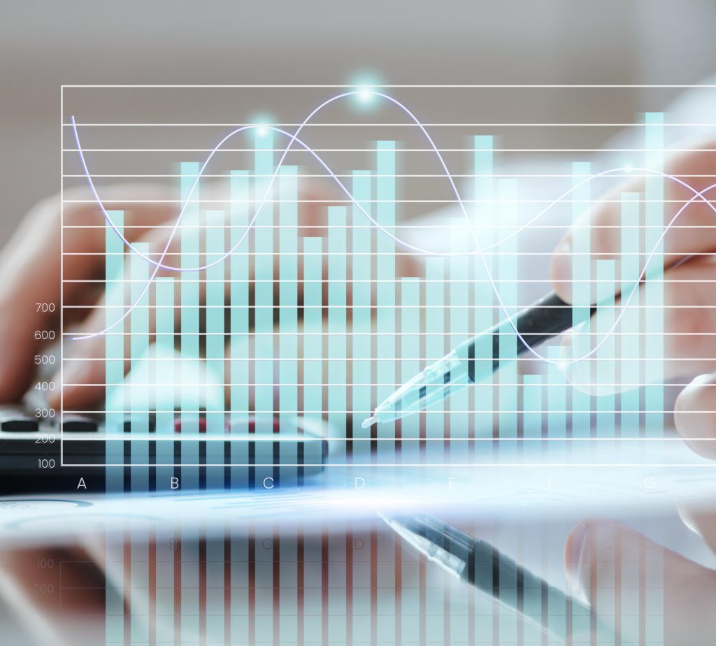 Management Consulting - image with hand typing on a laptop, overlayed with a graph